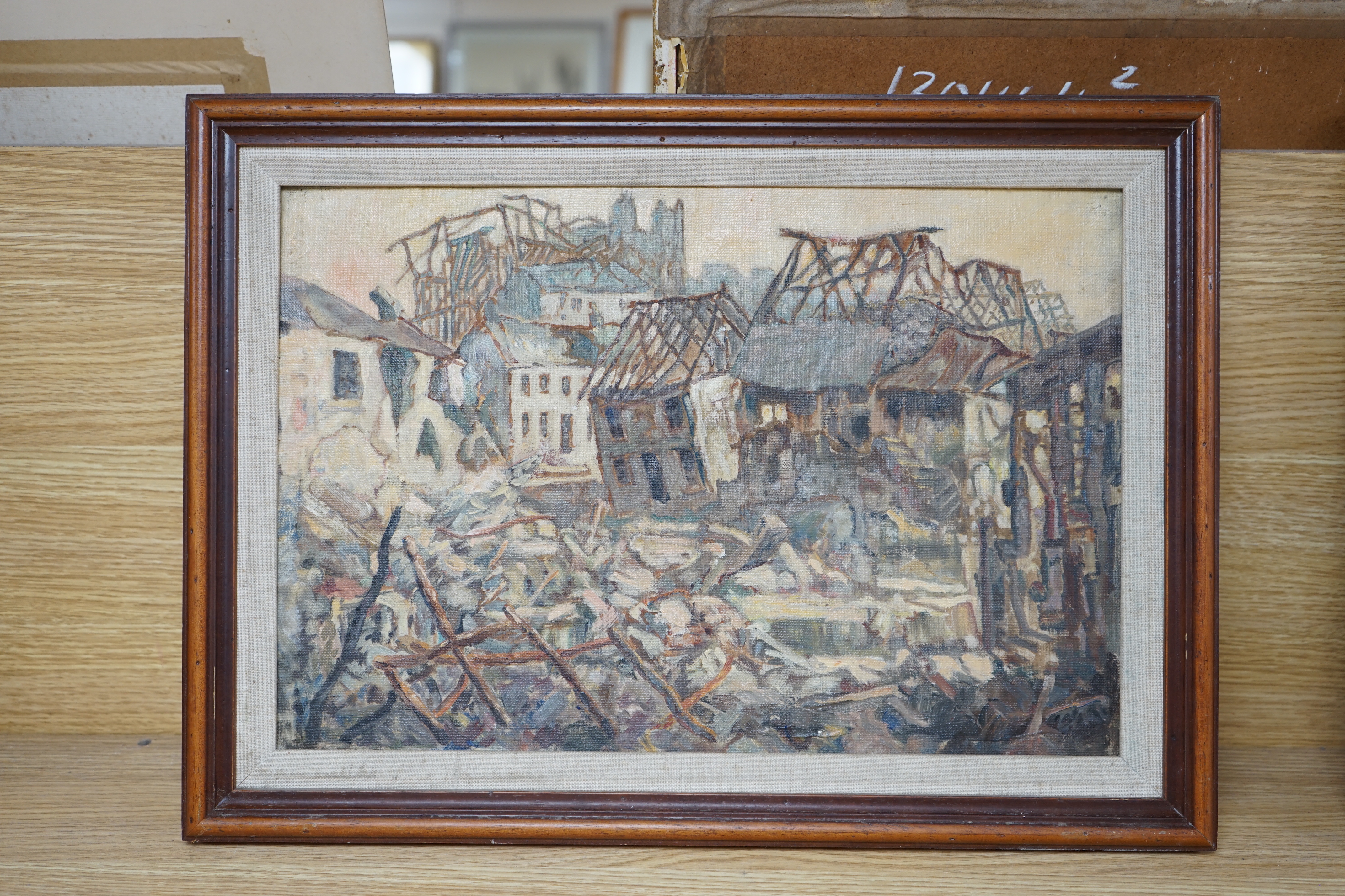 A 20th century WWI oil on canvas laid on board, Ruined French town, unsigned, 29 x 43cm